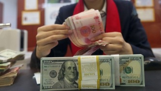 离岸、在岸人民币对美元汇率分别升破7.02、7.03 - 百博资讯